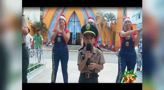 Niño de ocho años canta canción de la PNP por Navidad Niño de ocho años canta canción de la PNP por Navidad