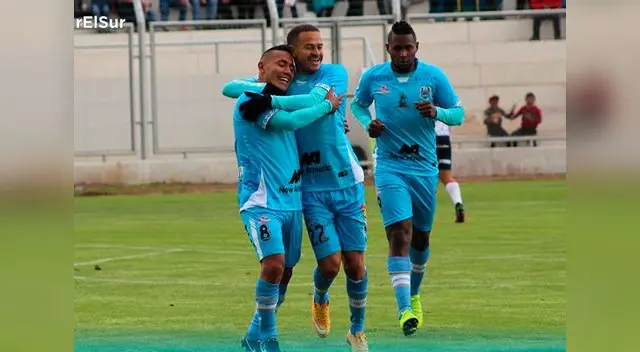 Millán felicita a Polar por el gol marcado