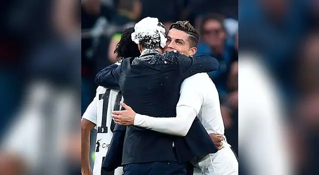 Festejo Cristiano con su técnico tras conseguir el título. FOTO: EFE