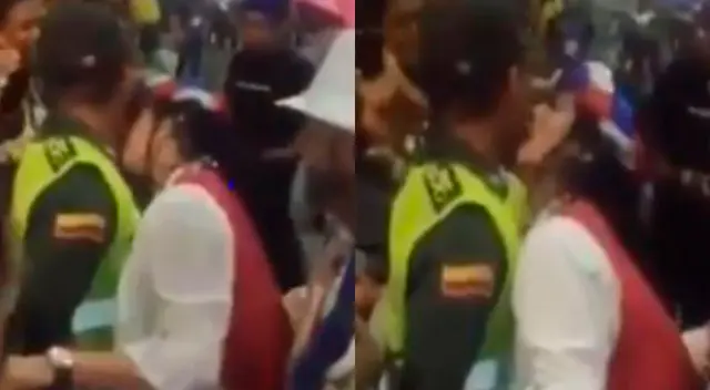 Polémico video registró cuando la mujer besó al uniformado en pleno evento. Polémico video registró cuando la mujer besó al uniformado en pleno evento.