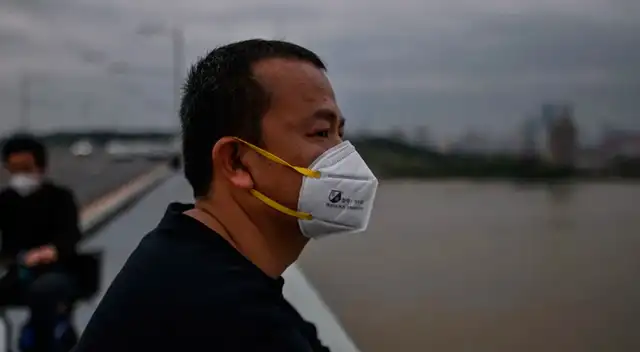 Pobladores de Jian tienen que usar mascarilla y controlarse la temperatura antes de salir a trabajar. Pobladores de Jian tienen que usar mascarilla y controlarse la temperatura antes de salir a trabajar.