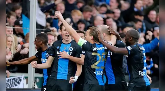 Jugadores del Brujas celebran la medida. Jugadores del Brujas celebran la medida.