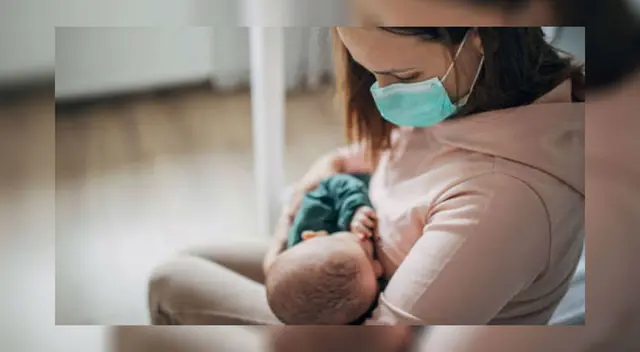 Madre de familia dando de lactar.