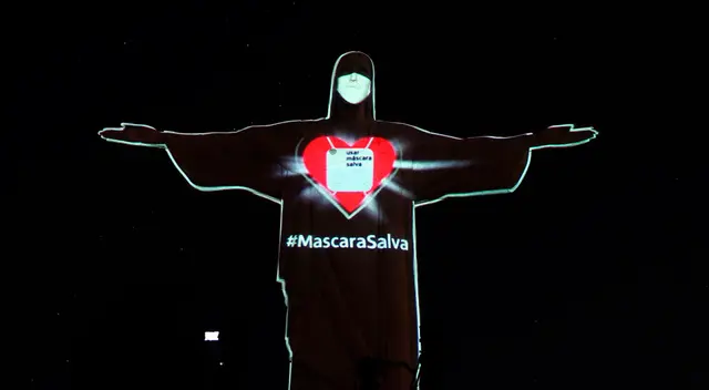 El Cristo Redentor se iluminó con una mascarilla.