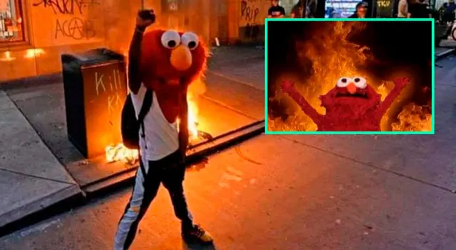 Manifestante se pone la máscara de Elmo y fotografía se vuelve viral. Manifestante se pone la máscara de Elmo y fotografía se vuelve viral.