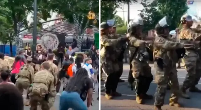 La Guardia Nacional y manifestantes juntos por George Floyd.