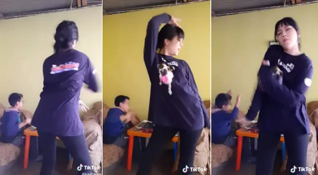 El niño aprovechó la música mientras su hermana ensayaba.