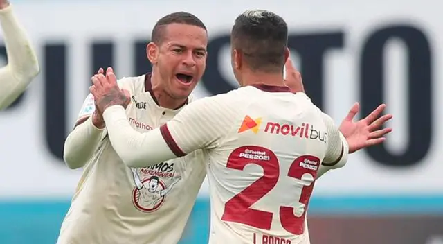 Millán celebra su gol con Barco.