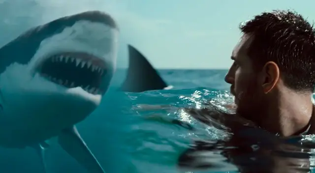 Messi rodeado de tiburones.