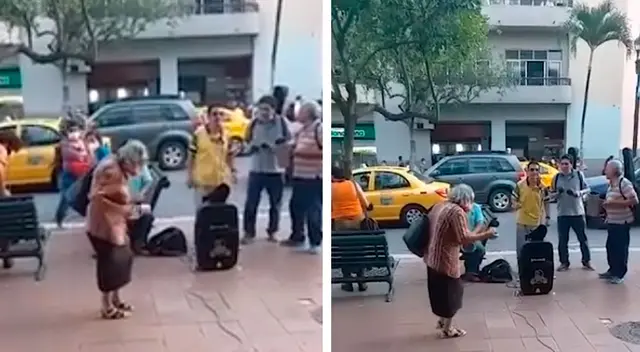 Anciana escucha música y baila en la calle