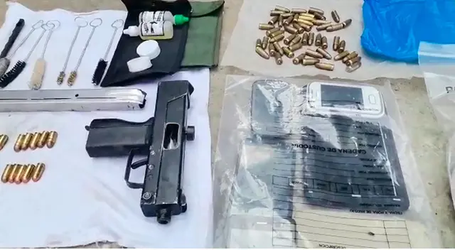 El arma mini uzi y lo incautado El arma mini uzi y lo incautado