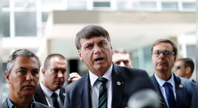 El presidente de Brasil, Jair Bolsonaro, habla con periodistas, en Brasilia, el 27 de enero de 2021. El presidente de Brasil, Jair Bolsonaro, habla con periodistas, en Brasilia, el 27 de enero de 2021.