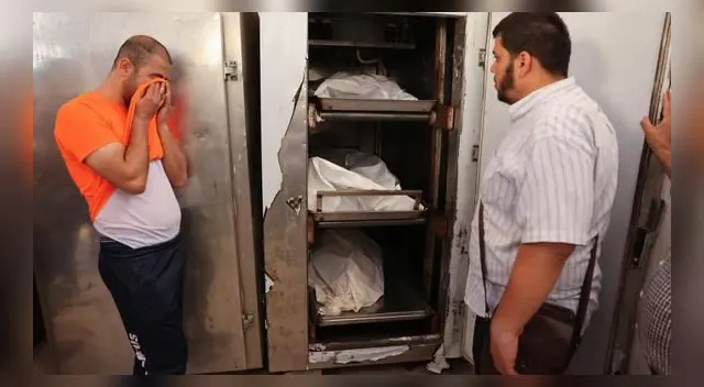 El hermano de Eyad Saleha llora frente a los cadáveres de sus parientes que murieron en un bombardeo de Israel contra su casa en Gaza.