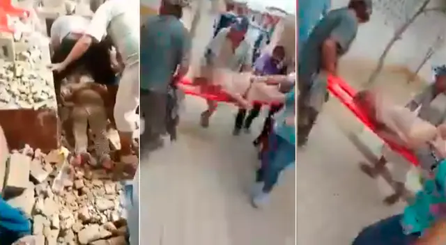 Mujer queda tendida entre restos de pared. y luego fue trasladada. Mujer queda tendida entre restos de pared. y luego fue trasladada.