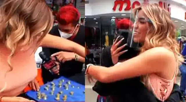 Gabriela Herrera ayuda a niño que canta en calles de Gamarra .