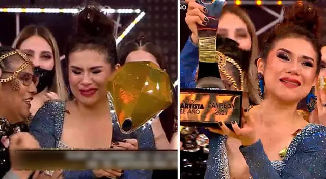 Ruby Palomino alza la copa de El artista del año.