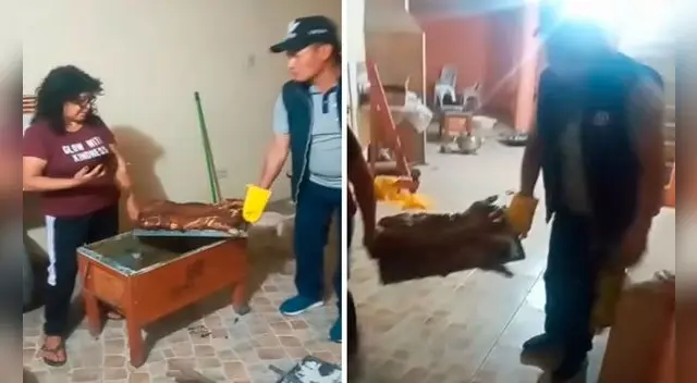 Una pareja se animó a bailar mientras llevaban una bandeja con el chancho recién cocinado; sin embargo, sufrió un incidente. Foto: captura de YouTube