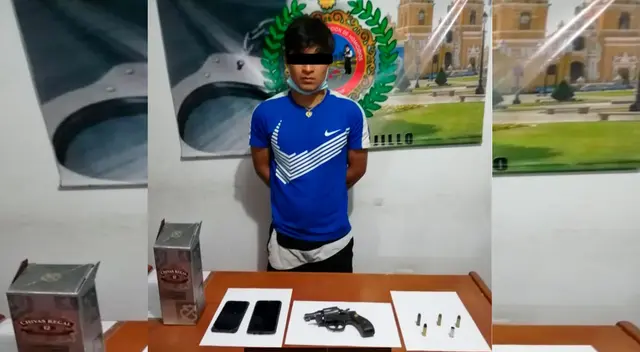 El detenido y el arma que le incautó la PNP El detenido y el arma que le incautó la PNP