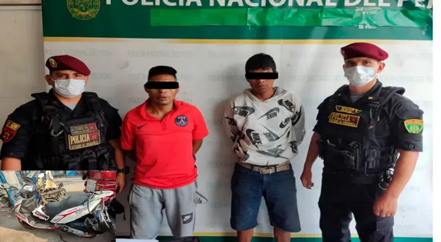 Los detenidos y la moto robada incautada Los detenidos y la moto robada incautada