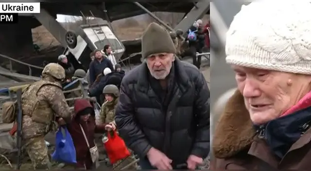 Ucranianos salen de la capital de Kiev ante aproximación de fuerzas rusas en la zona.