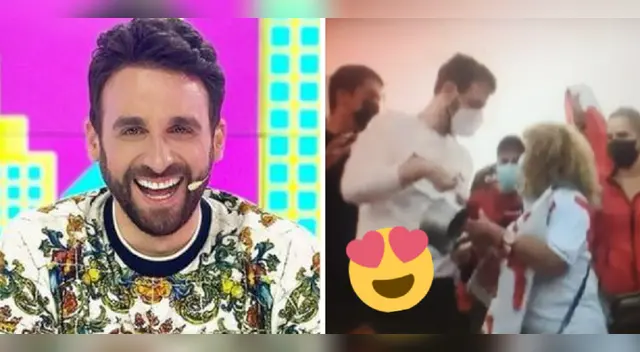 Rodrigo González recibió olla de mujer en la marcha.