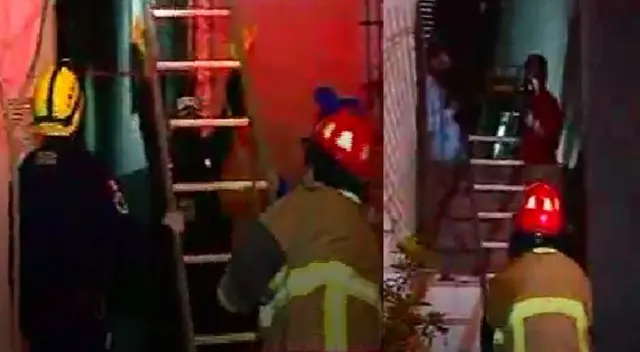 Bomberos rescatan a mujer que cayó del tercer piso del hostal.