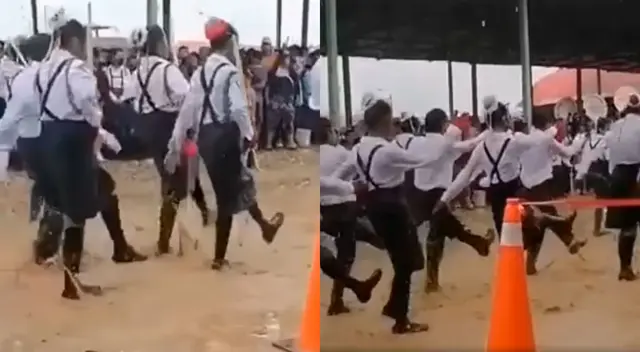 estudiantes desfilan en plena lluvia estudiantes desfilan en plena lluvia