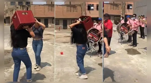 Joven celebra con su caja de cerveza y la rompe con singulares pasos de baile.