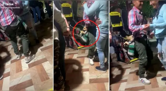 La escena del perrito dentro de un morral y su dueño bailando se robó las miradas de miles de usuarios en TikTok. La escena del perrito dentro de un morral y su dueño bailando se robó las miradas de miles de usuarios en TikTok.