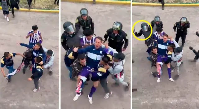 Policía agredió a hincha de Alianza Lima que tenía cargado a Pablo Lavandeira. Policía agredió a hincha de Alianza Lima que tenía cargado a Pablo Lavandeira.
