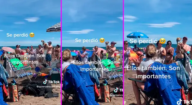 En el video viral se puede ver a los bañistas con el perrito en brazos. En el video viral se puede ver a los bañistas con el perrito en brazos.