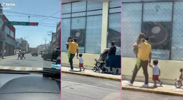 El perrito iba en los brazos de su dueño, mientras que el menor caminaba y escena es viral en TikTok. El perrito iba en los brazos de su dueño, mientras que el menor caminaba y escena es viral en TikTok.