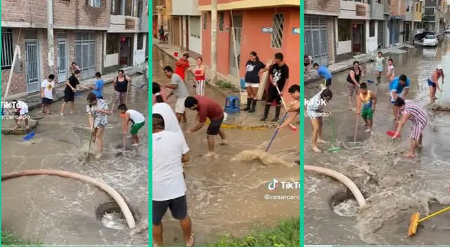 Vecinos alistaron recogedores y escobas para retirar agua acumulada en su vecindario.