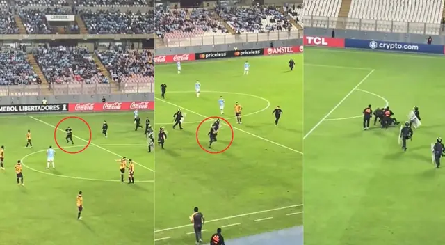 El joven hincha fue detenido por la policía tras ser rodeado por varios efectivos.