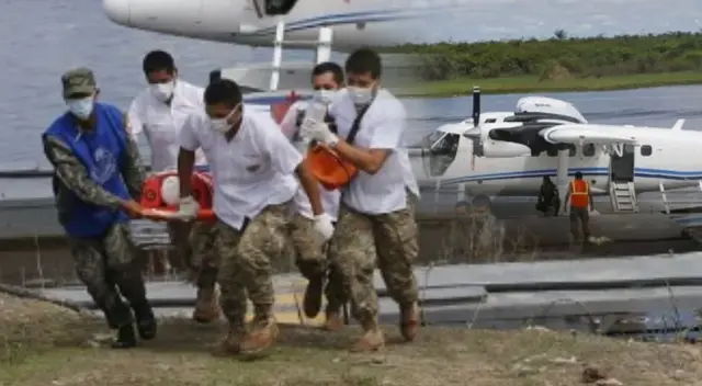 Mujer llevaba cinco horas esperando para ser trasladada a la ciudad de Iquitos.