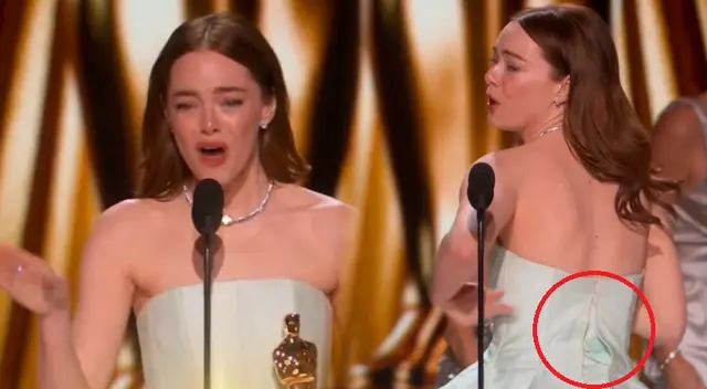 Emma Stone recibe su estatuilla con el vestido roto. Emma Stone recibe su estatuilla con el vestido roto.