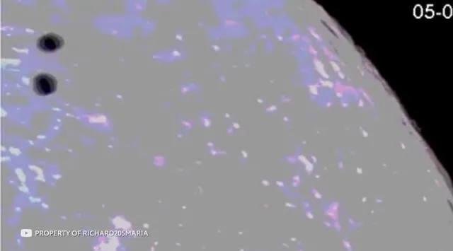  Astrónomos captaron dos puntos negros en la Luna.   