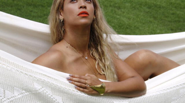 Beyoncé posa en topless tendida sobre una hamaca
