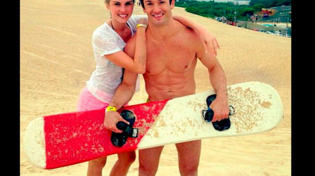 Lo olvida con gimnasta brasileño Diego Hypólito, con quien goza en playa.
