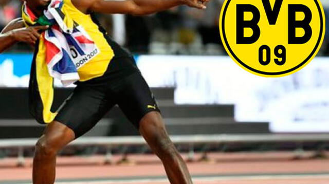 Usain Bolt con el escudo del Borussia Dortmund