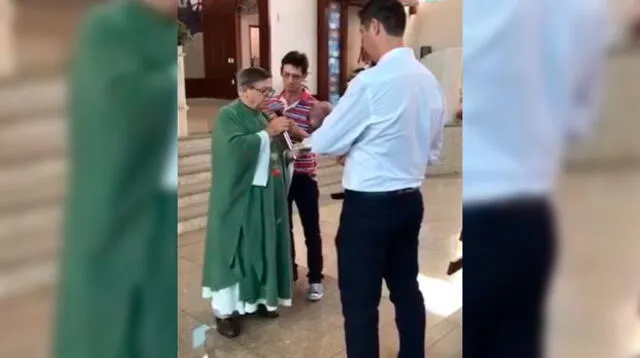 Video viral en Facebook muestra cómo el sacerdote intenta dar la bendición a bebé con un objeto inusual