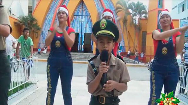 Niño de ocho años canta canción de la PNP por Navidad