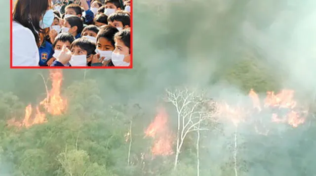 Niños van con mascarillas a clases tras incendios forestales en Madre de Dios  