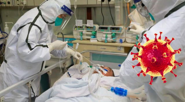 Médicos tratan a un paciente con COVID-19 en el Hospital Zhongnan de la Universidad de Wuhan, imagen (27 de enero de 2020).