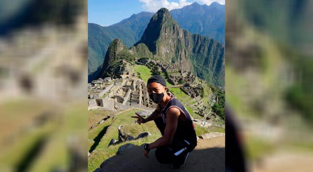 El joven japonés Jesse Katayama disfrutando su visita a Machu Picchu.