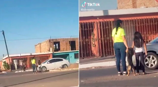 El perrito cruzó gracias a la ayuda de sus dueñas.