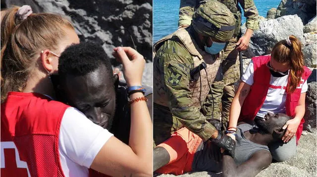 España: migrante marroquí es abrazado por voluntaria de la Cruz Roja tras llegar nadando hasta Ceuta.