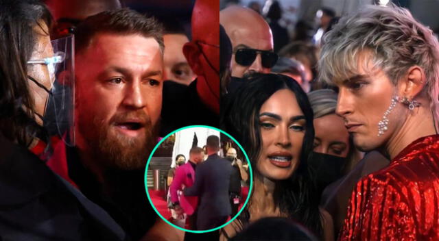 El luchador Conor McGregor no aguantó pulgas y sorprendió al tirarle una bebida al cantante Machine Gun Kelly en plena alfombra roja de los premios MTV.