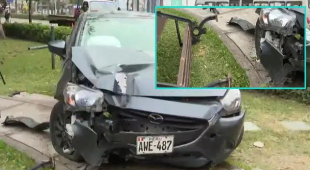 Auto choca contra banca de parque barranquino.