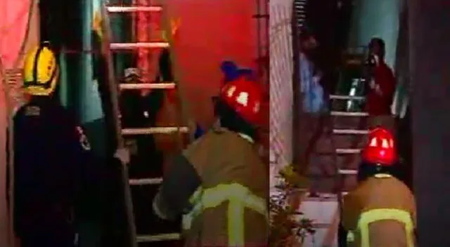 Bomberos rescatan a mujer que cayó del tercer piso del hostal.